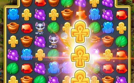 Spielszene aus Jewels of Egypt: Spielfeld mit Skarabäen, Ankh-Zeichen und Edelsteinen